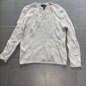 Gray crew neck sweater.